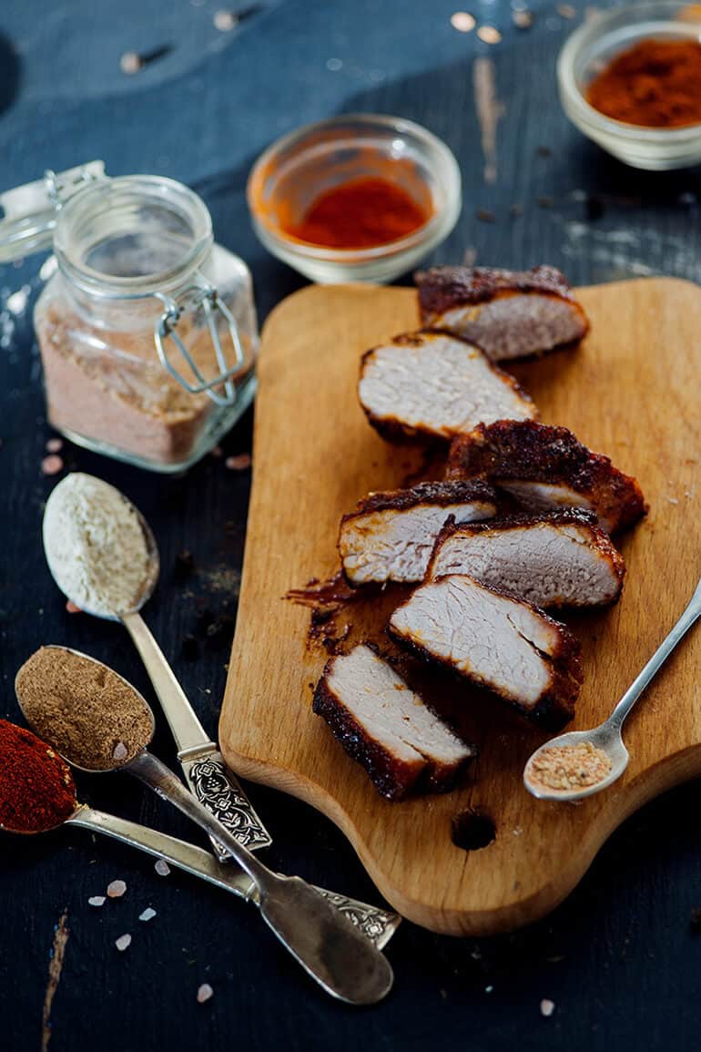 cooked bbq pork covered in bbq rub