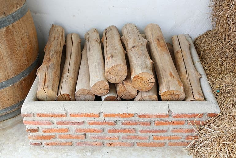 oak firewood in a basket