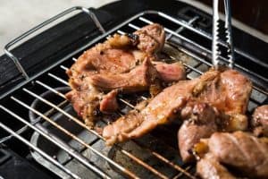 meat cooking on smokeless electric grill