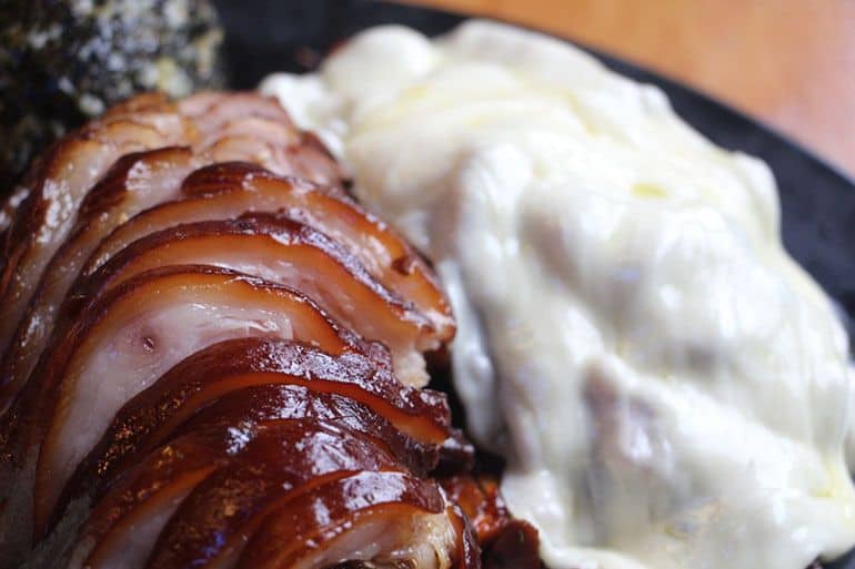 glazed ham sliced and served on plate