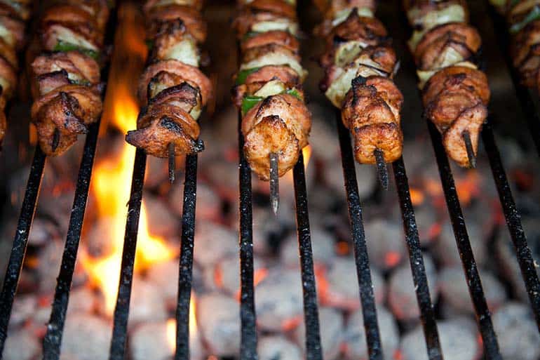 barbecue food on grill grates