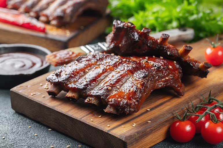 bbq ribs served on cutting board