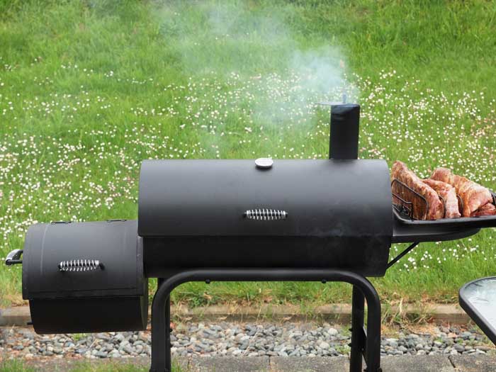 offset smoker with side firebox