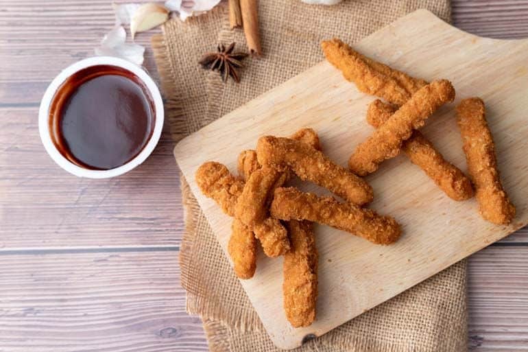 homemade bbq recipe served next to chicken fingers