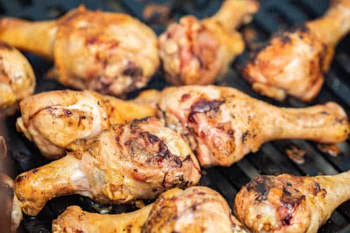 chicken drumsticks on a grill