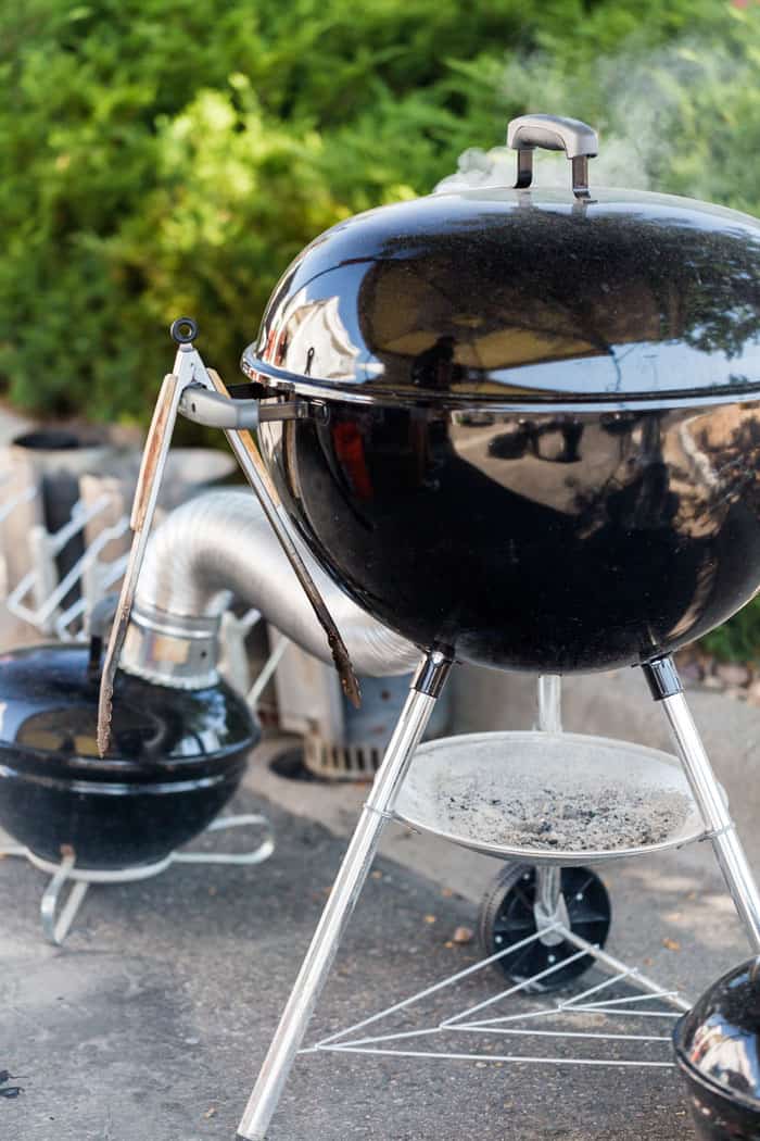 smoking kettle grill in garden patio