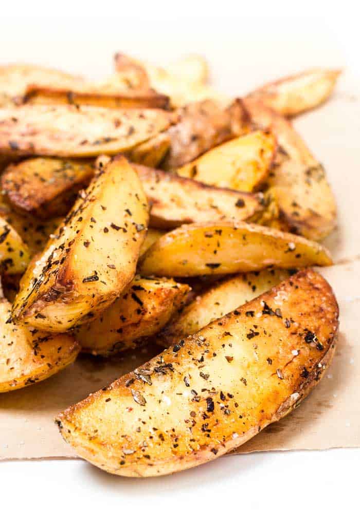 potato wedges seasoned in paprika salt black pepper and potato flakes