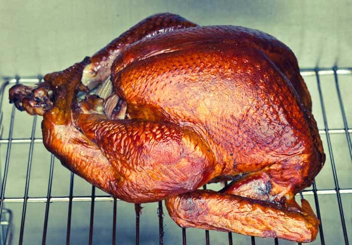 bbq smoked turkey on electric smoker grates