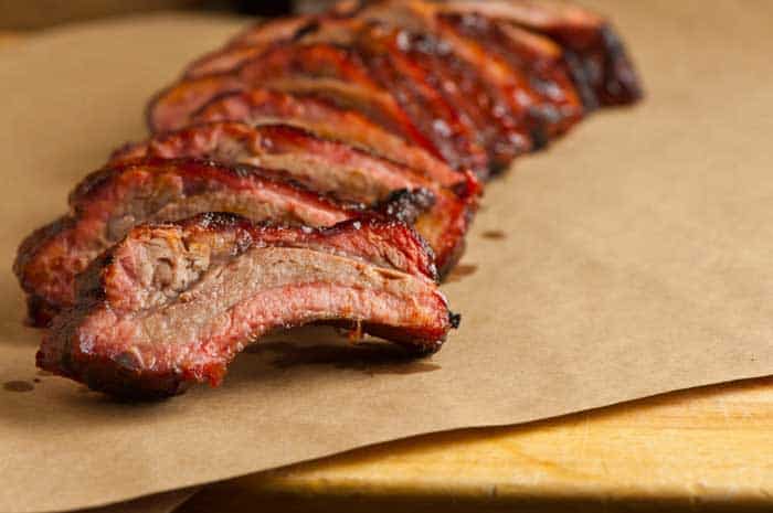 sliced pork ribs after being cooked in electric smoker