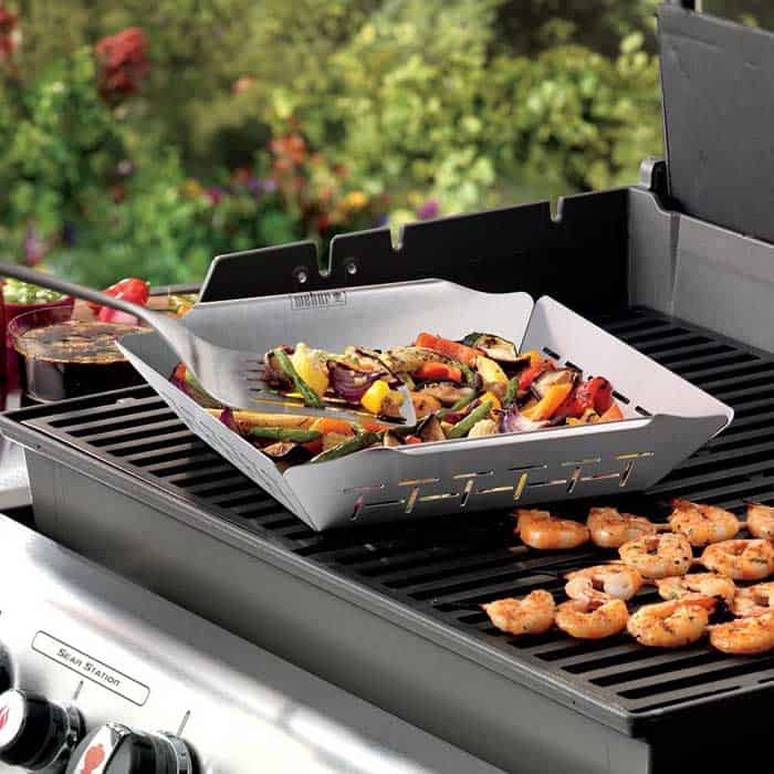weber deluxe grill basket cooking on grates