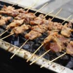 grilled pork on yakitori grill