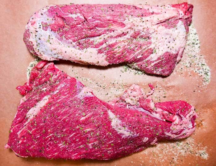 raw tri tip cuts with herb seasoning