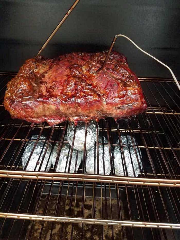 thermopro tp20 probes in large brisket on grill grates