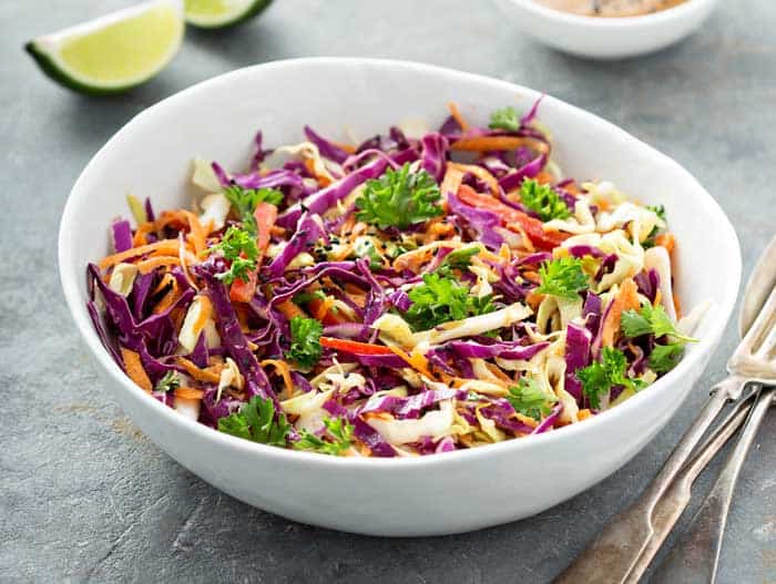 Asian cole slaw with sesame and peanut butter dressing