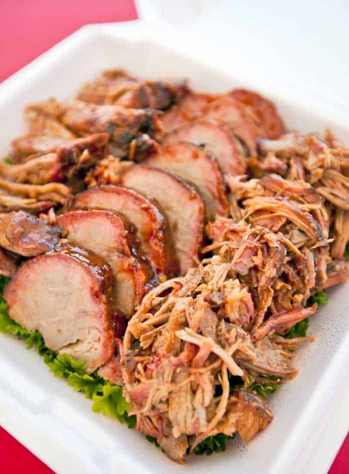 BBQ Pulled pork butt on a bed of parsley