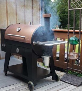 pit boss austin xl pellet grill on backyard patio