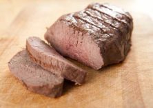 beef tenderloin roast sliced cutting board