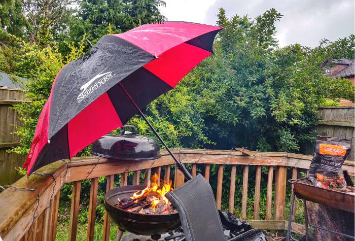 charcoal grilling in the rain