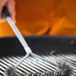 cleaning grill with metal brush