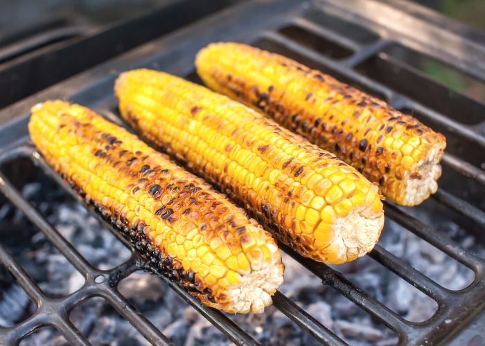 ears of corn on grill grates