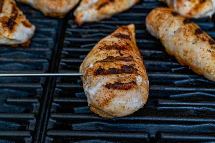 grilled striped chicken on a grill
