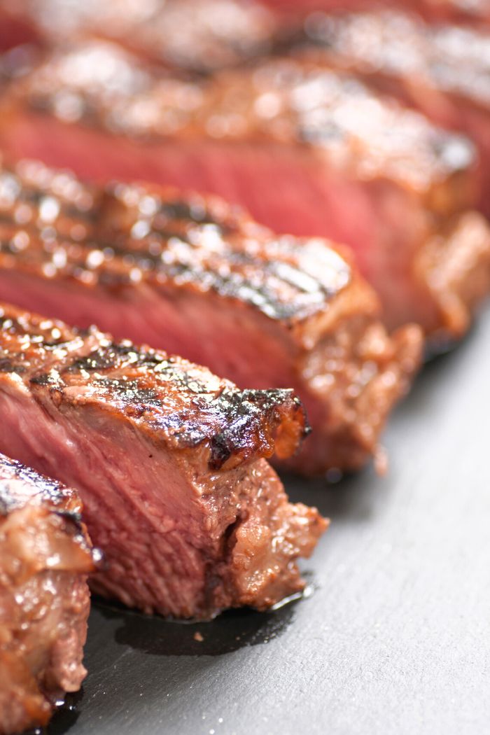 grilled wagyu ribeye steak slices showing tender beef texture and caramelized surface