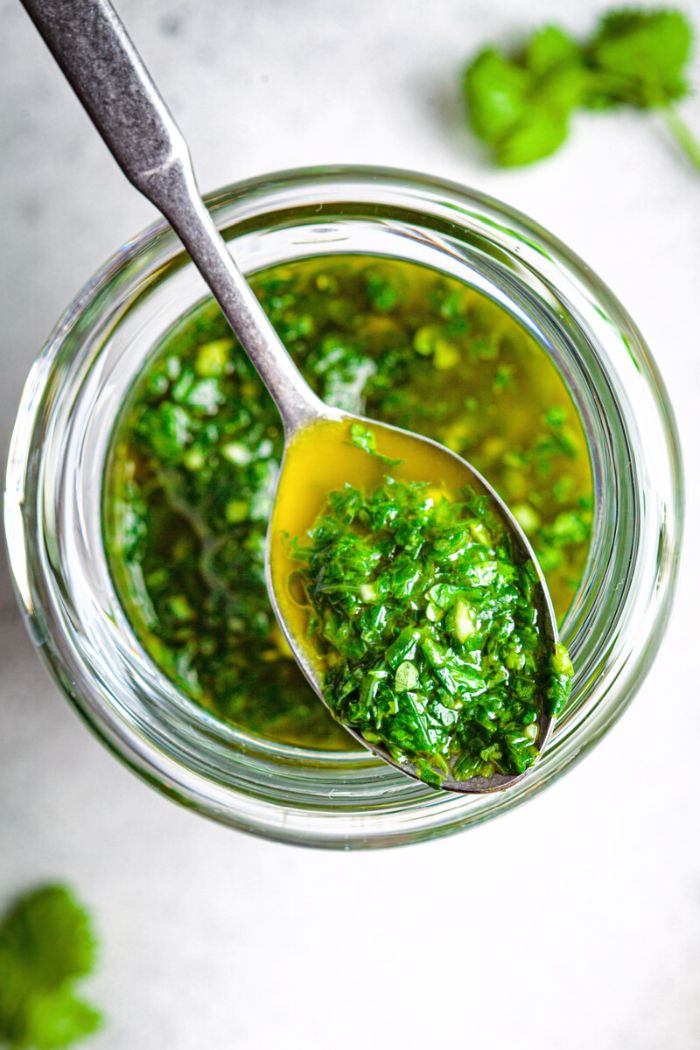 topdown view of fresh chimichurri made with olive oil and parsley