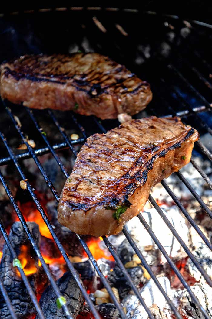 sirloin steak on charcoal grill