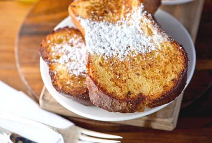 french toast cooked on the grill served with icing sugar