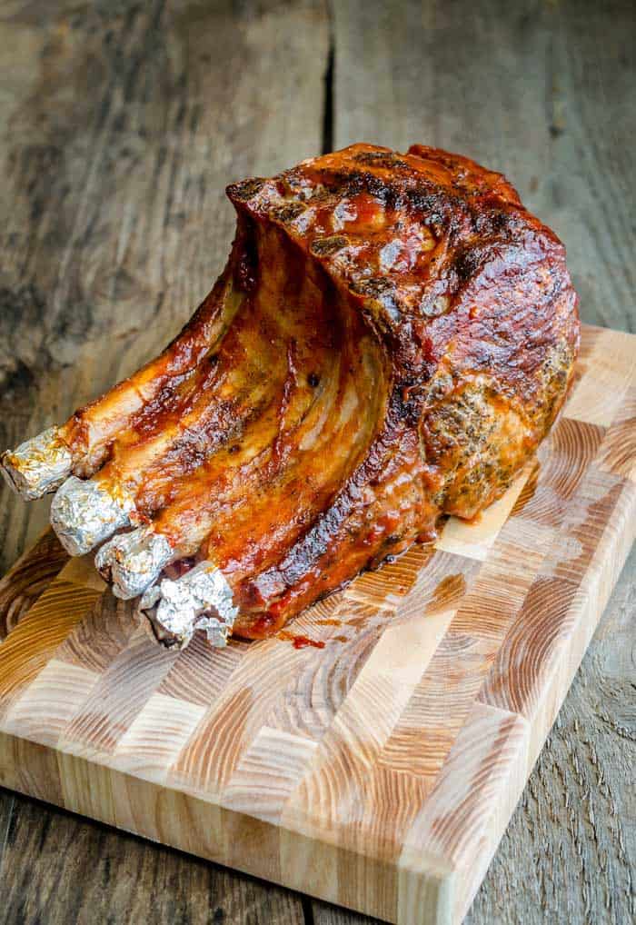 smoked pork rack on chopping board